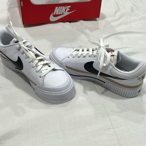 Women’s Nike court legacy fit. White. Brand new in box. Size 10. Never worn.